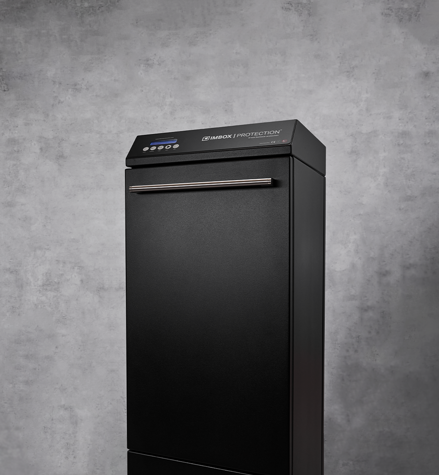 Black IMBOX Original shoe protection machine on gray background