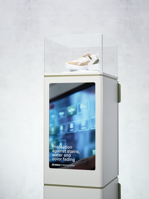 White IMBOX Flagship with promotional video on display