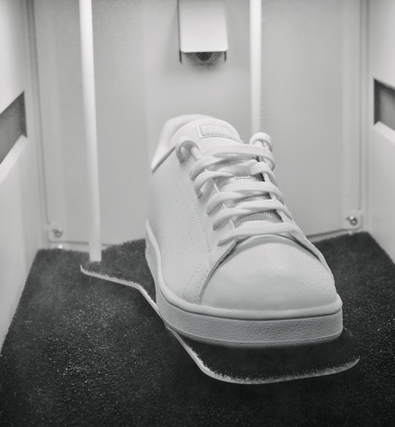 White sneakers placed inside IMBOX Flagship and getting the IMBOX treatment