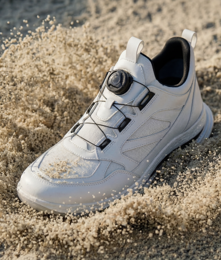 IMBOXed and protected white golf shoe in sand