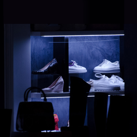 Black IMBOX Original shoe protection machine on gray background