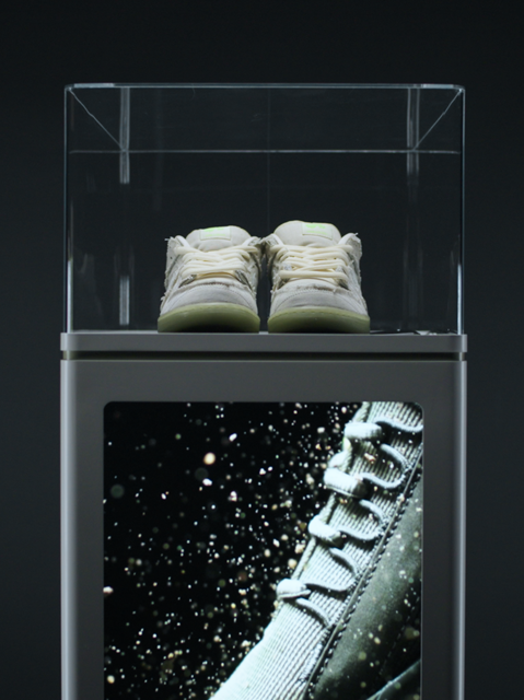 Close-up of IMBOX Flagship screen and door handle