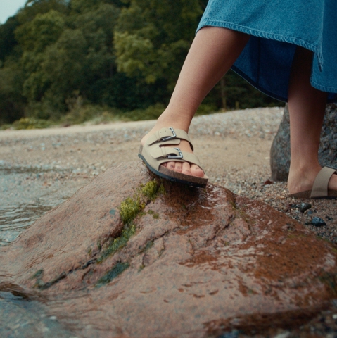 Sandals on stone at the beach 